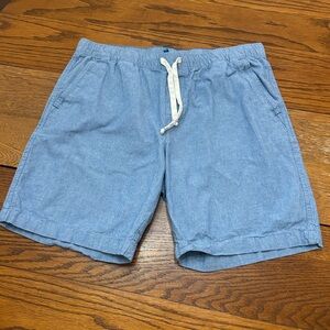 Charleston Threads men's lined shorts, featuring blue chambray fabric.